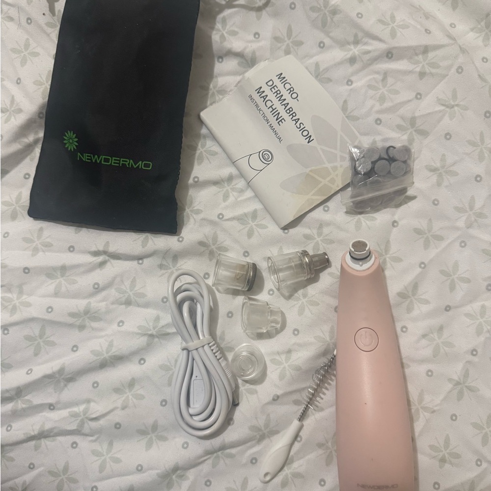 Pink Microdermabrasion Device